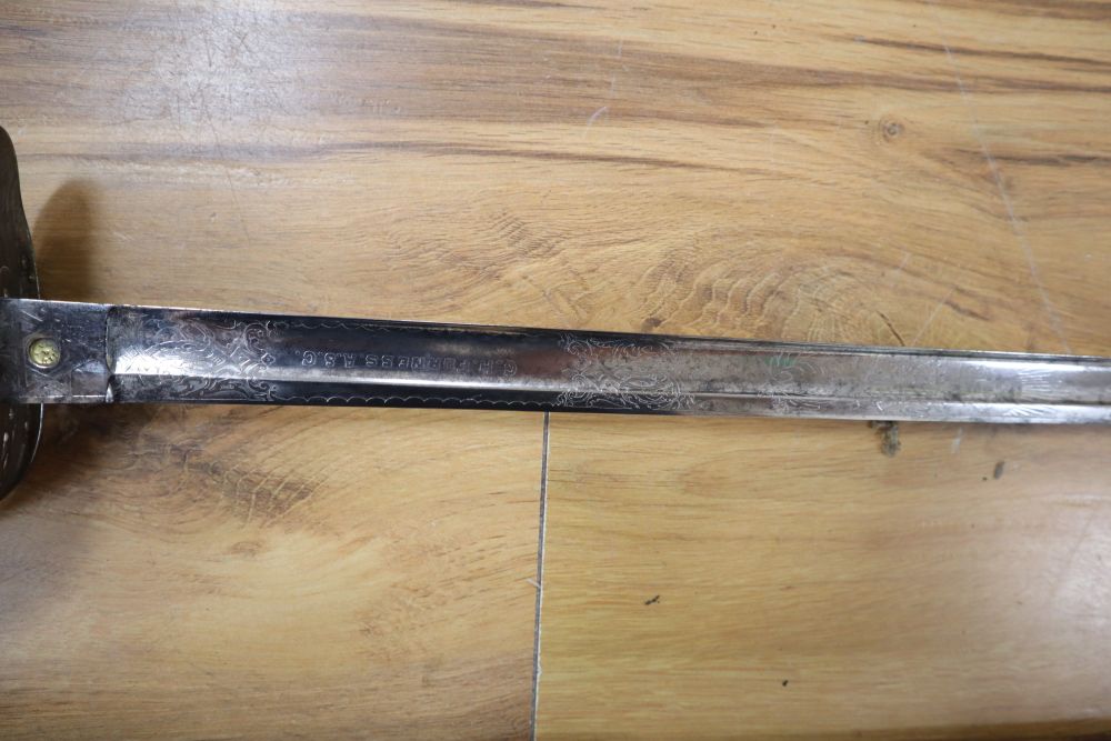 An Edward VII Infantry Officers sword, shagreen grip and 91cm etched, single edged blade, leather scabbard